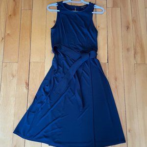 BCBG Maxazria faux wrap midi dress in navy. Size small.